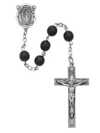 7mm black glass beads with sterling silver crucifix and center. Deluxe gift boxed.