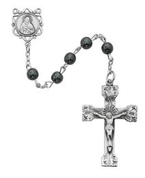 6mm genuine hematite beads with sterling crucifix and center. Deluxe gift boxed.