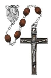 6x8mm brown wood beads with pewter center and enameled crucifix. Deluxe gift boxed.