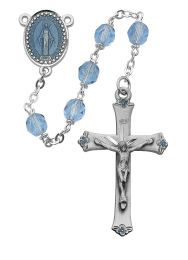 7mm blue glass beads with pewter crucifix and blue enameled center.  Deluxe gift boxed.
