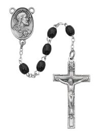 4x6mm black oval wood beads with pewter center and crucifix.  Deluxe gift boxed.