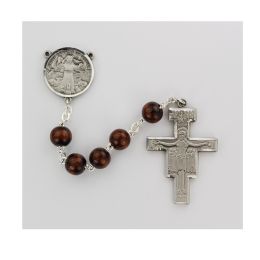 4x6mm brown wood beads with a sterling center and crucifix.  Deluxe gift boxed.