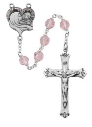 7mm tin cut pink crystal beads with sterling silver crucifix and center. Deluxe gift boxed.