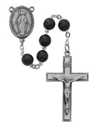 7mm black wood round beads with sterling center and crucifix.  Deluxe gift boxed.