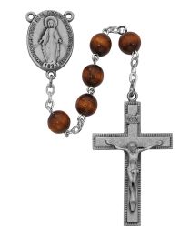 7mm brown wood round beads with sterling center and crucifix.  Deluxe gift boxed.