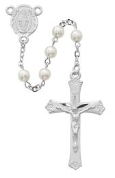 6mm pearl like glass beads with rhodium plated pewter center and crucifix.  Deluxe gift boxed.
